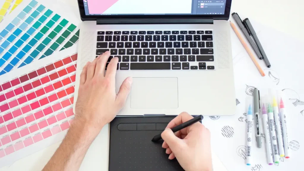 Modern graphic design workspace with creative tools, featured image for blog article